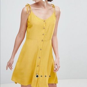 Yellow button dress